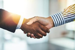 Two people shaking hands
