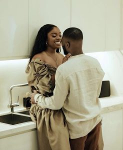 Boyfriend whispering sweet names to girlfriend